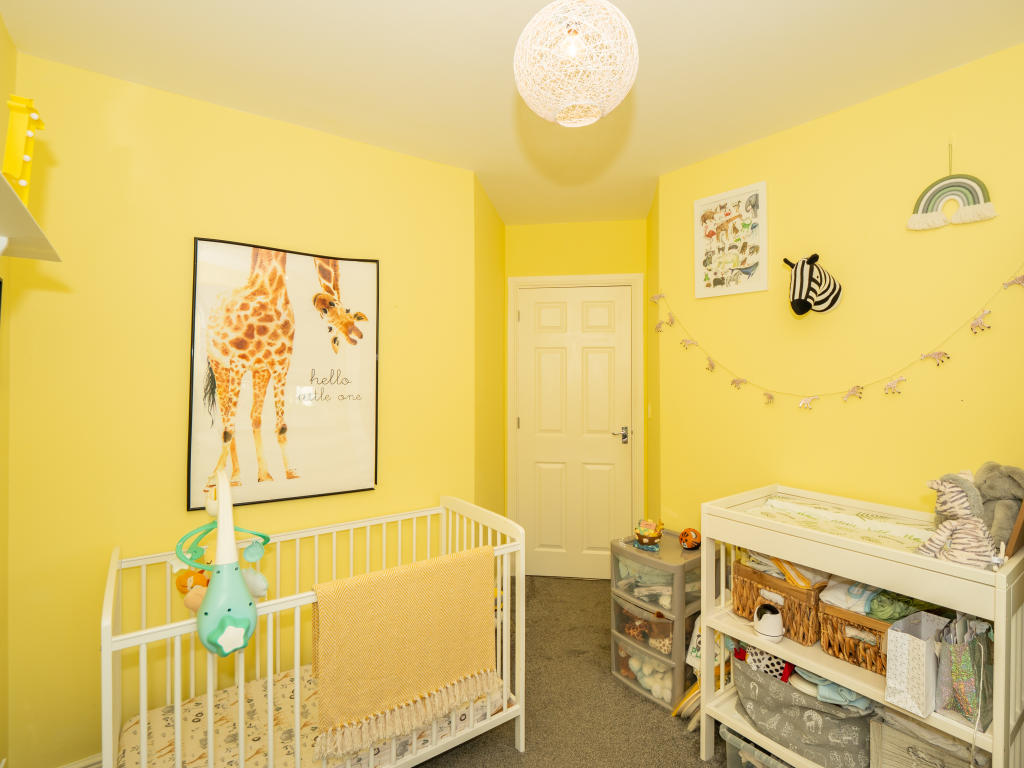 yellow-painted-nursery-room-for-baby-boys